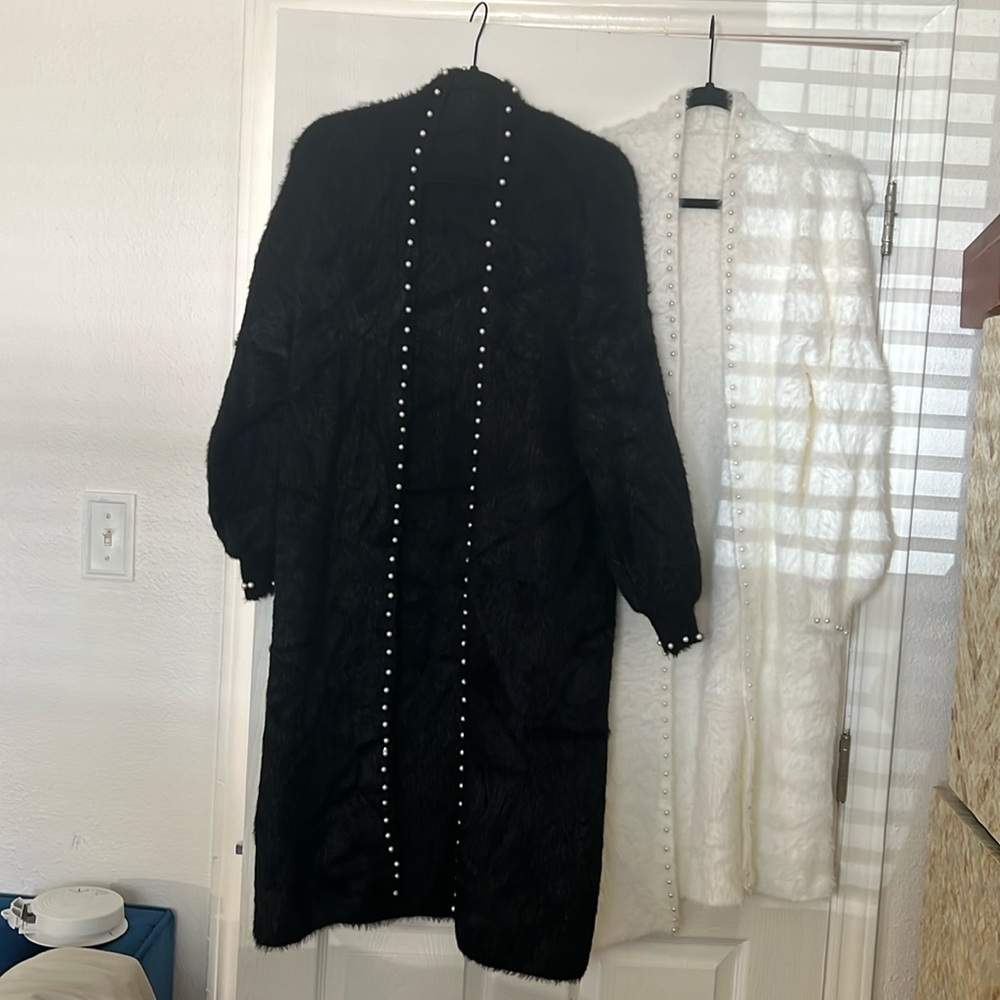 Long sweaters, trimmed and pearls